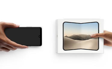 Hands exchanging phones, Android on the left without a box, on the right is a new iPhone Duo in box.